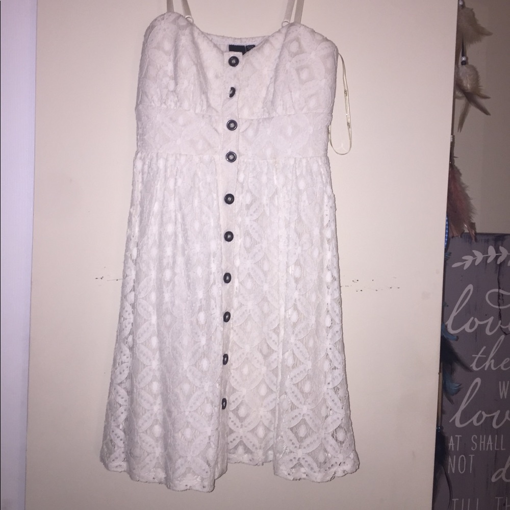 White mini dress with button